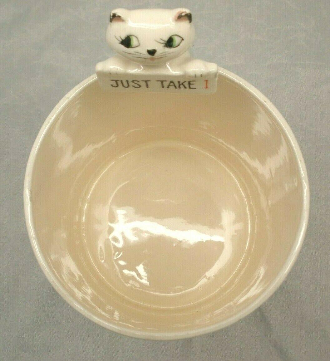 Interior of Cozy Kittens Pop-Up Cookie Jar showing raised kitten mechanism.