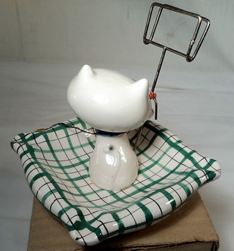Rear view of Cozy Kittens ashtray with match holder.