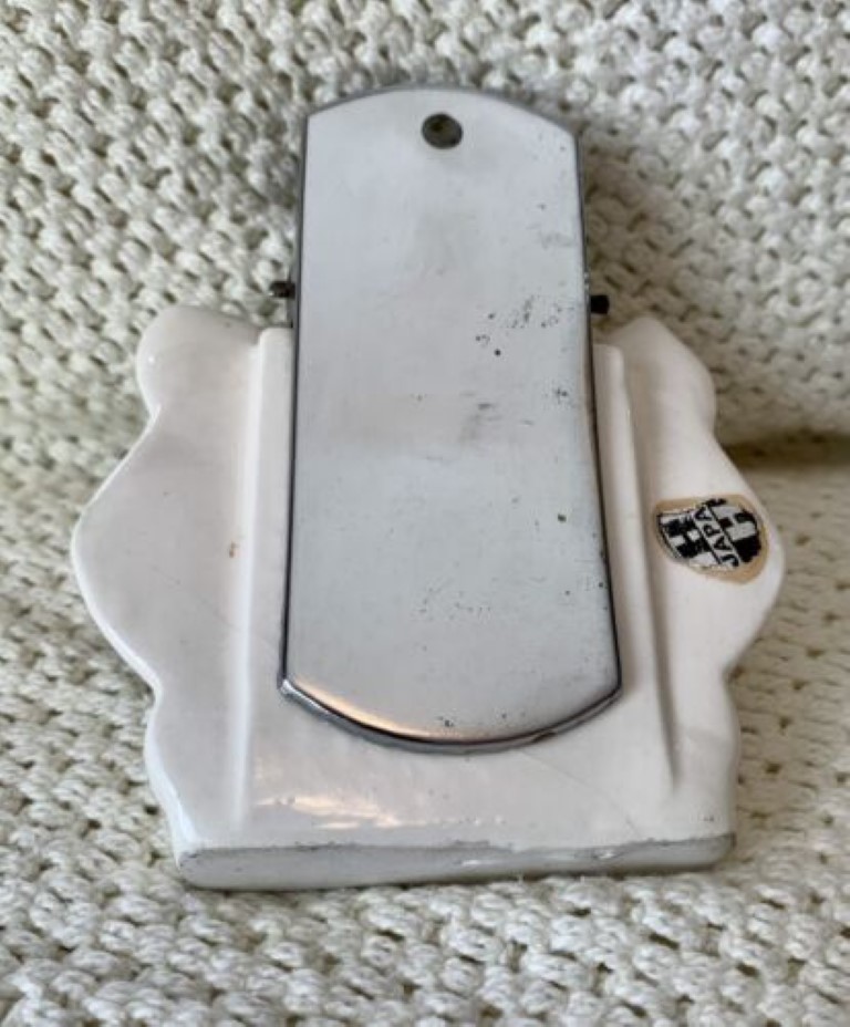 Rear view of Cozy Kittens Kitty Catch showing metal clip and Japan foil label.
