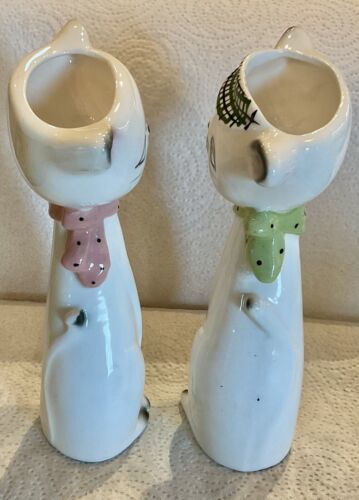 Top view of Cozy Kittens bud vases showing flower openings in the heads.