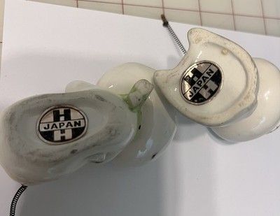 Undersides of Holt-Howard Cozy Kittens Bee Bothered figures showing Japan foil labels.