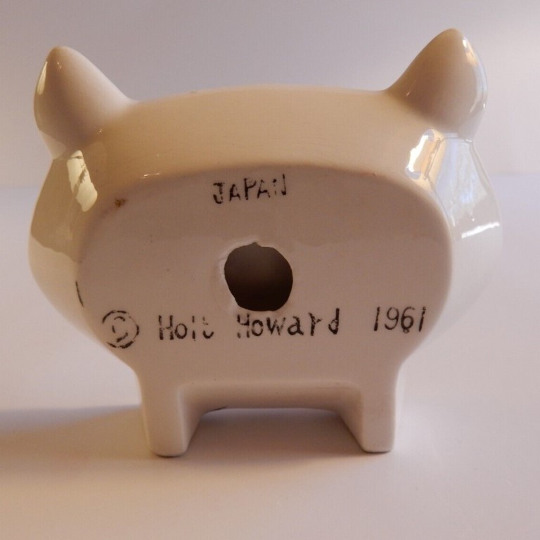 Back view of a Holt-Howard Cozy Kittens Tea Bag Toter marked 1961, showing a production hole.