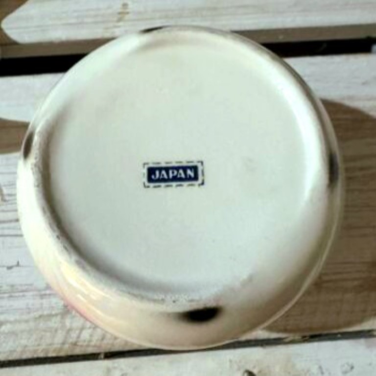 Underside of Cozy Kittens Cream Crock with Japan label.