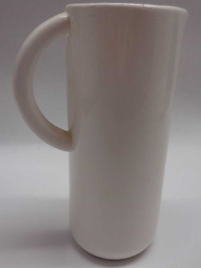 Rear view of Cozy Kittens Meow Pitcher.