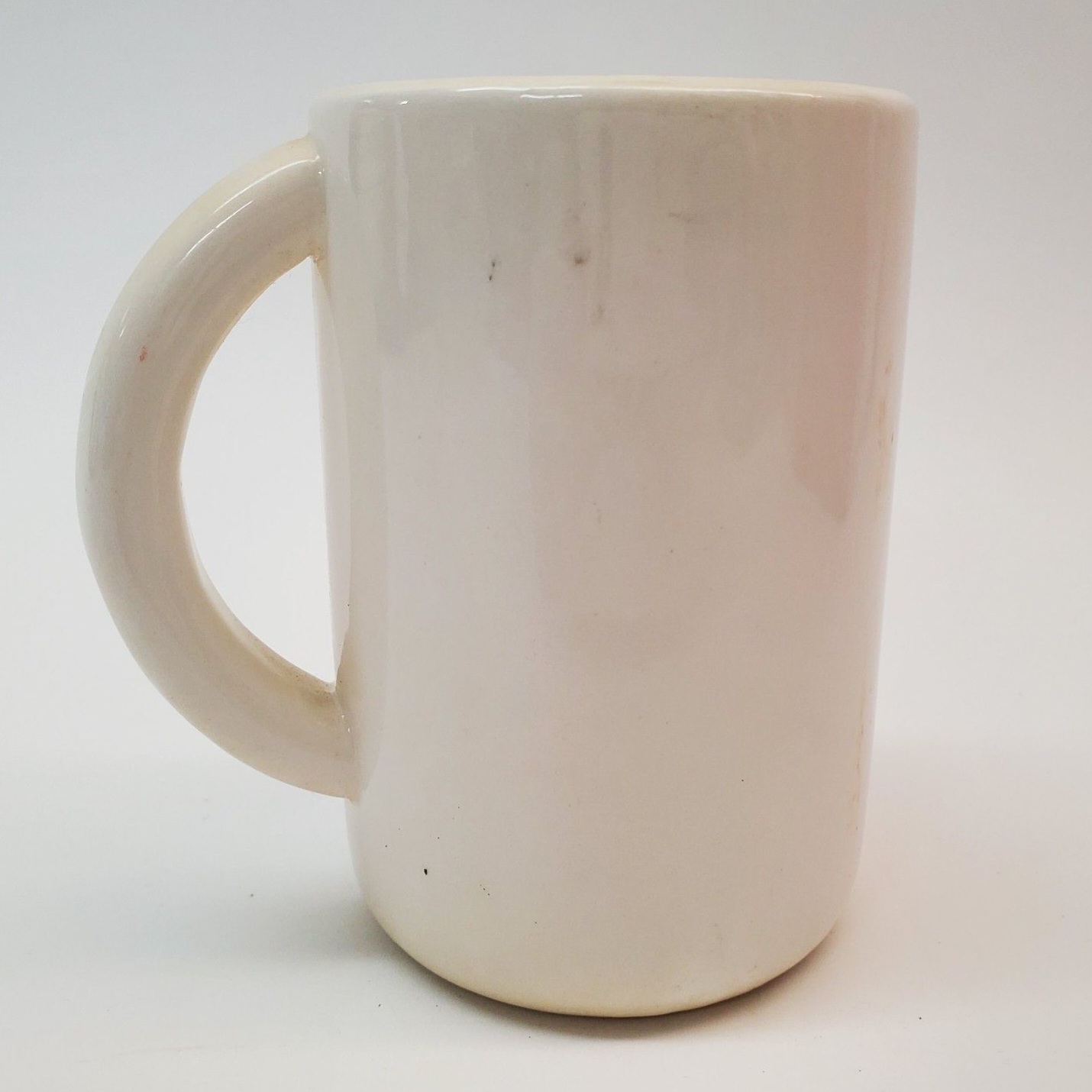 Rear view of Cozy Kittens Meow Mug.