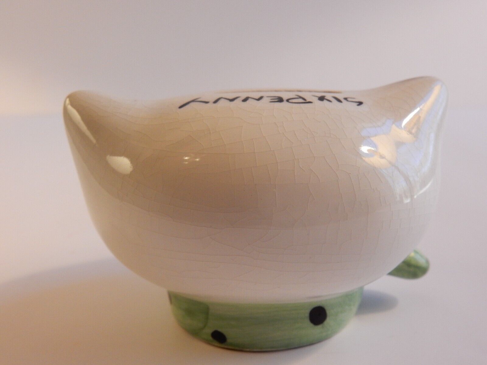 Rear view of British Cozy Kittens Six Penny Kitty Bank