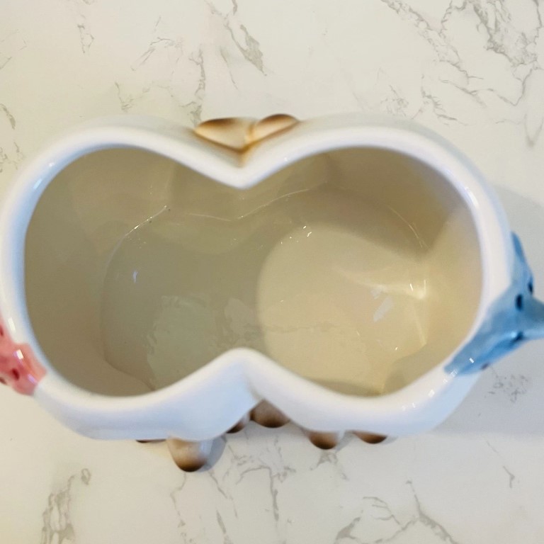 Interior of Grant Holt Associates Cozy Kittens cookie jar.