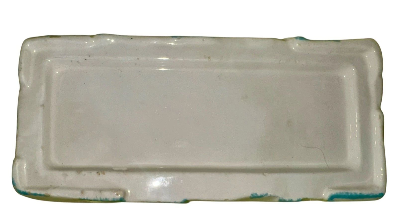 Underside of Kitchen Cubs Butter Berg base.