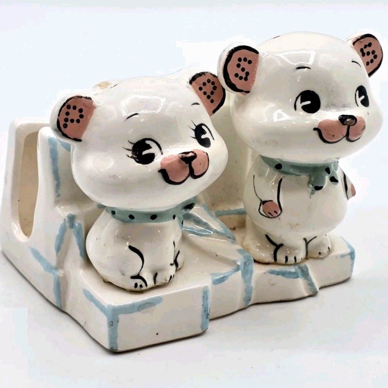 Three-quarter view of Kitchen Cubs napkin holder and shakers.
