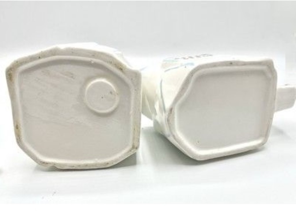 Undersides of Kitchen Cubs Cream Crock and Sugar Crock.