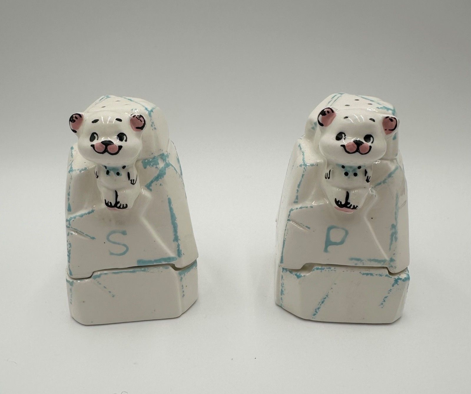 Pair of Kitchen Cubs Egg Cups with Seasoners, front view.