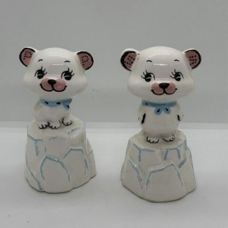 Kitchen Cubs Shake and Listen salt and pepper shakers, front view.
