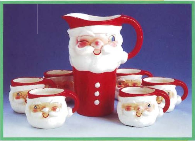 Holt Howard Winking Santa Version A pitcher with matching mugs.