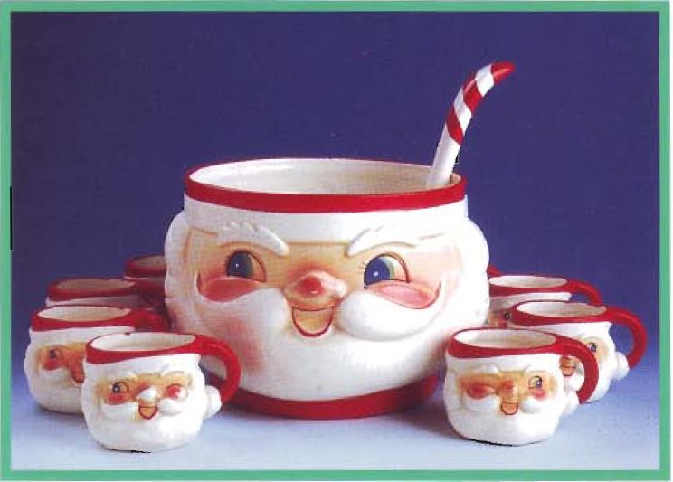 Holt Howard Winking Santa punch bowl set with mugs and candy-cane-striped ladle.