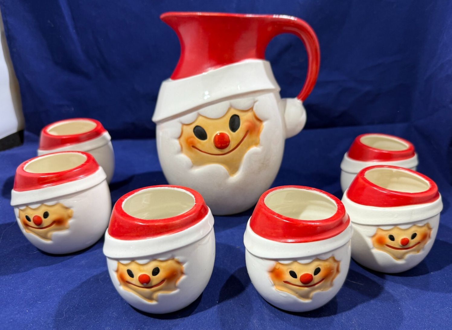 Holt Howard Cloud Santa egg nog pitcher with handleless cups.