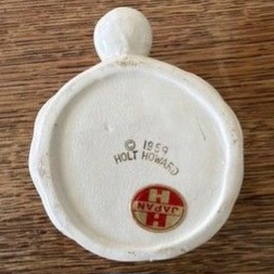 Underside of Holt Howard Winking Santa Type B mug with 1959 backstamp and retailer label.