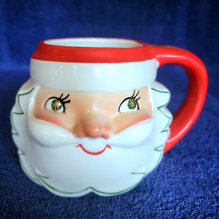 Holt Howard Gold Eye Santa mug, front view.