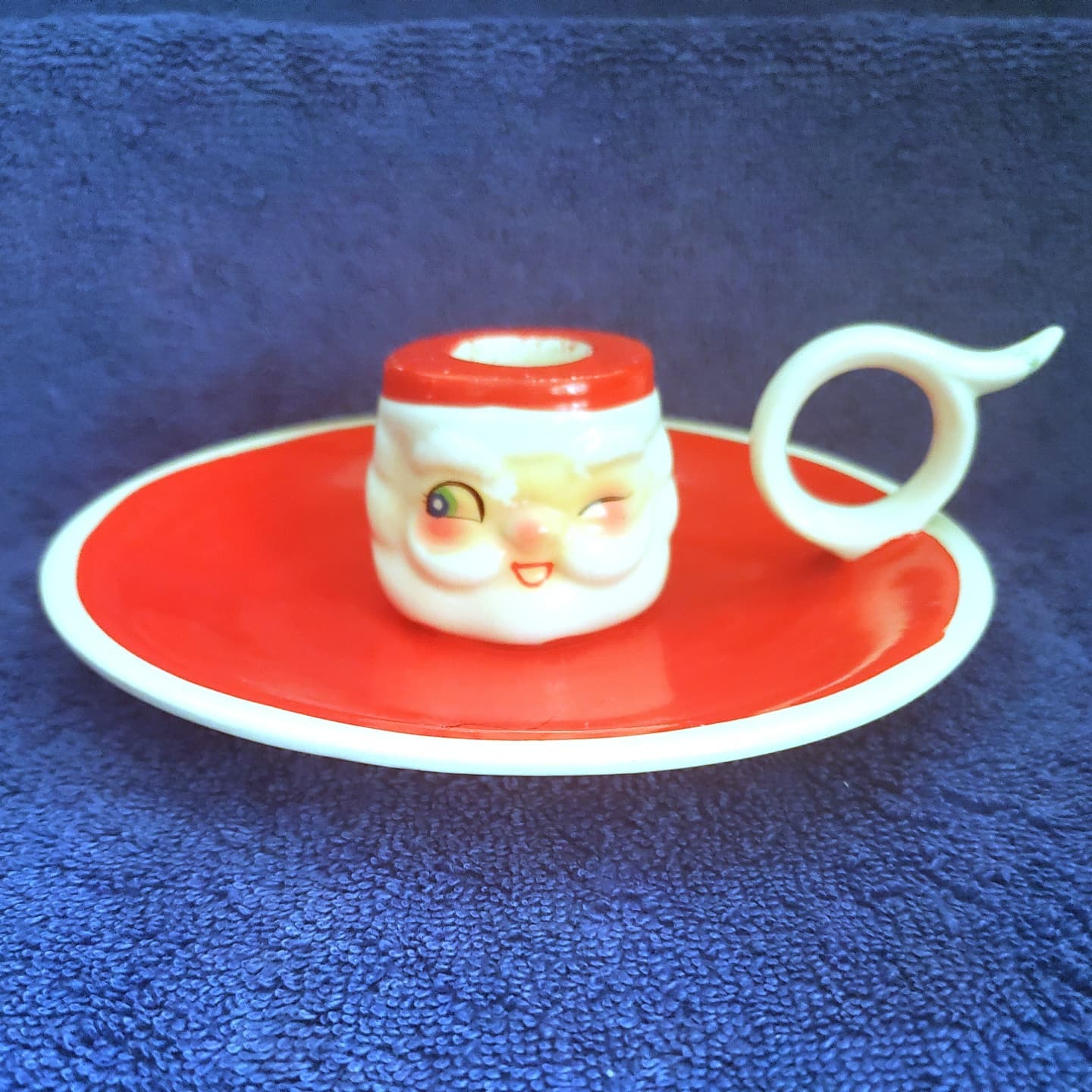 Holt Howard Winking Santa Type A candle plate, front view.