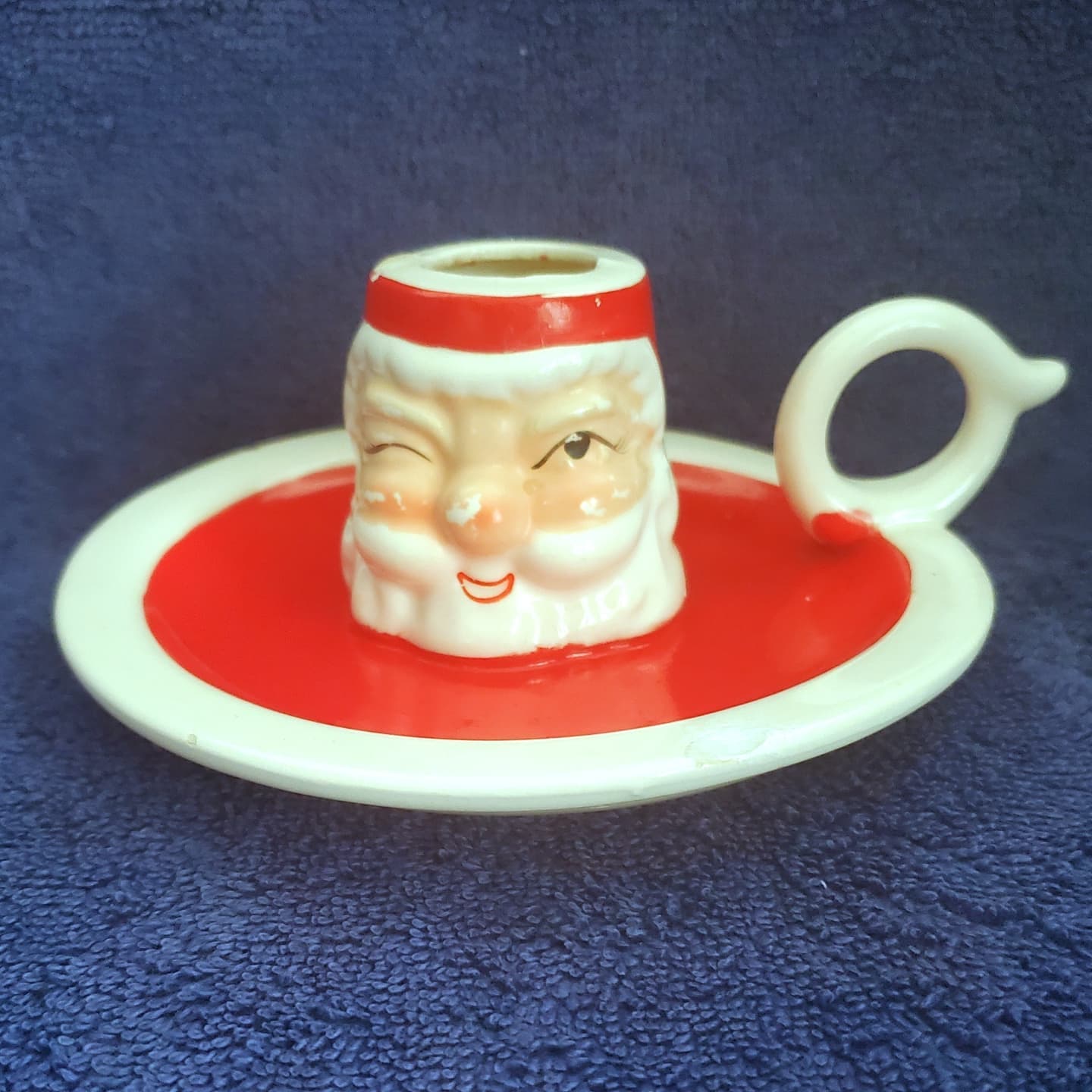 Holt Howard Winking Santa Type B candle plate, front view.