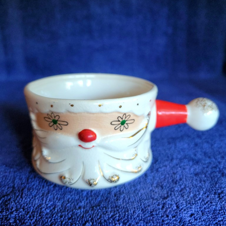 Holt Howard Starry-Eyed Santa stick handle mug with Daisy-style eyes.