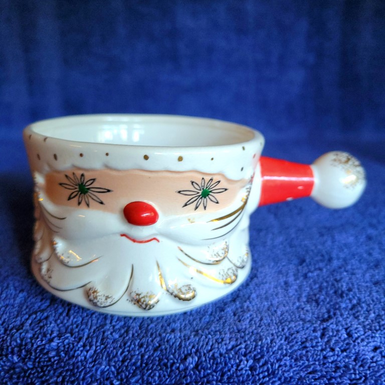 Holt Howard Starry-Eyed Santa stick handle mug with Atomic-style eyes.