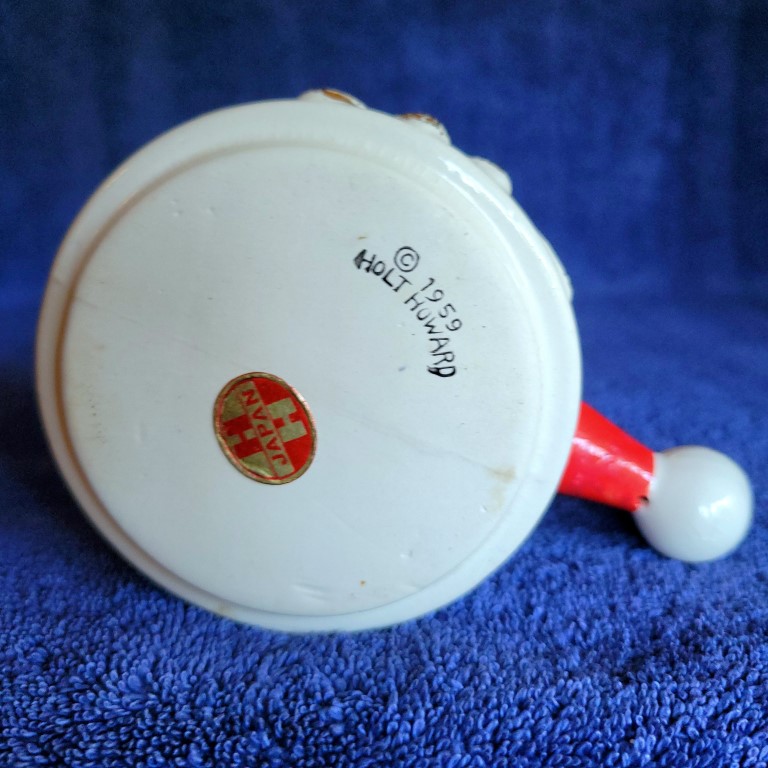 Underside of Holt Howard Starry-Eyed Santa Atomic-eye stick handle mug.