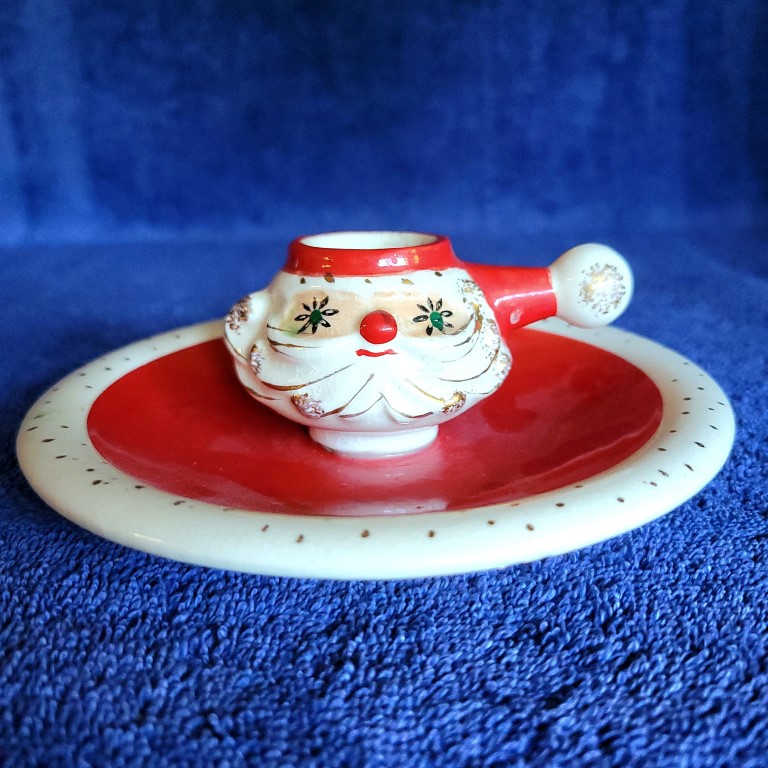 Holt Howard Starry-Eyed Santa candle plate with Atomic-style eyes.