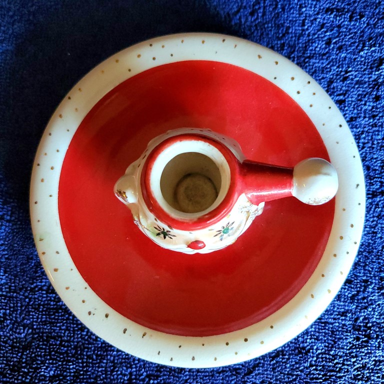 Top view of Holt Howard Starry-Eyed Santa Atomic-eye candle plate.