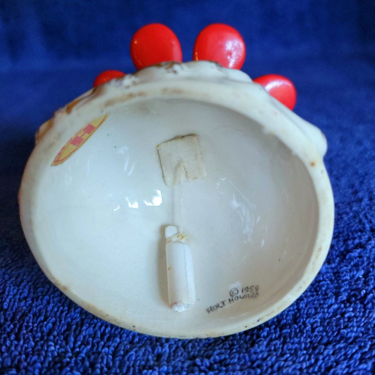 Underside of Holt Howard Starry-Eyed Santa Bell Candlestick Holder showing 1959 backstamp.