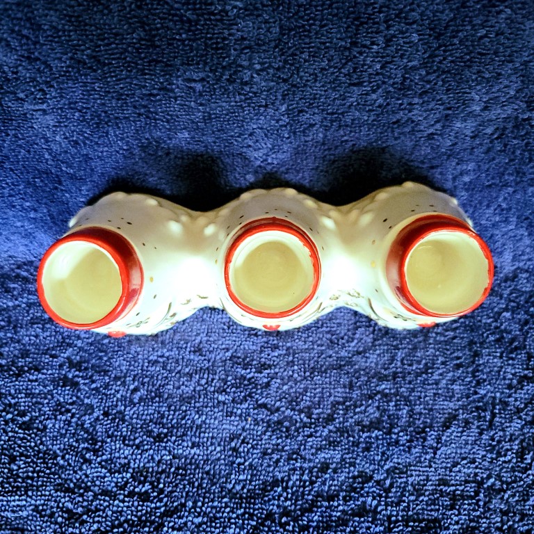 Top view of Daisy-eye Holt Howard Starry-Eyed Santa Triple Candle Holder.
