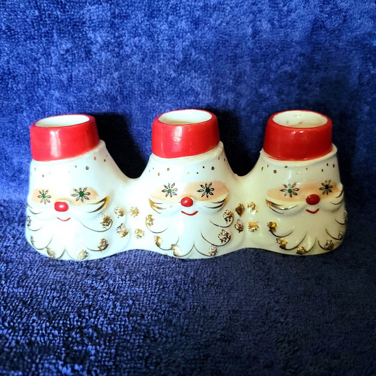 Holt Howard Starry-Eyed Santa Triple Candle Holder with Atomic-style eyes.
