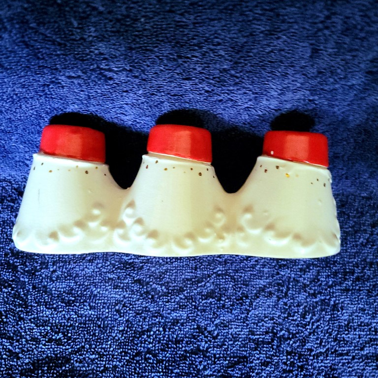 Rear view of Atomic-eye Holt Howard Starry-Eyed Santa Triple Candle Holder.
