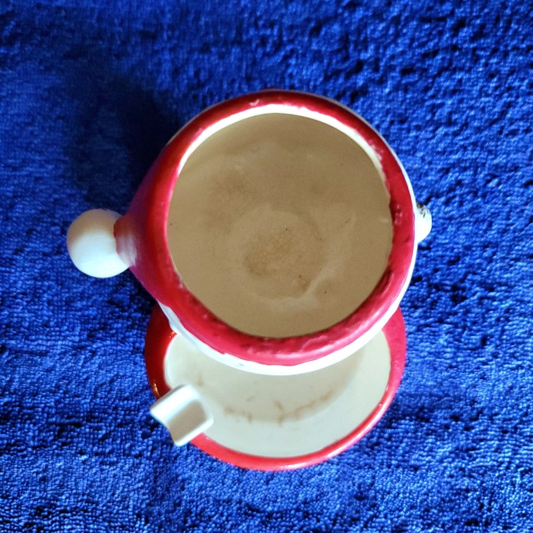 Top view of Atomic-eye Holt Howard Starry-Eyed Santa Ashtray and Match Holder.