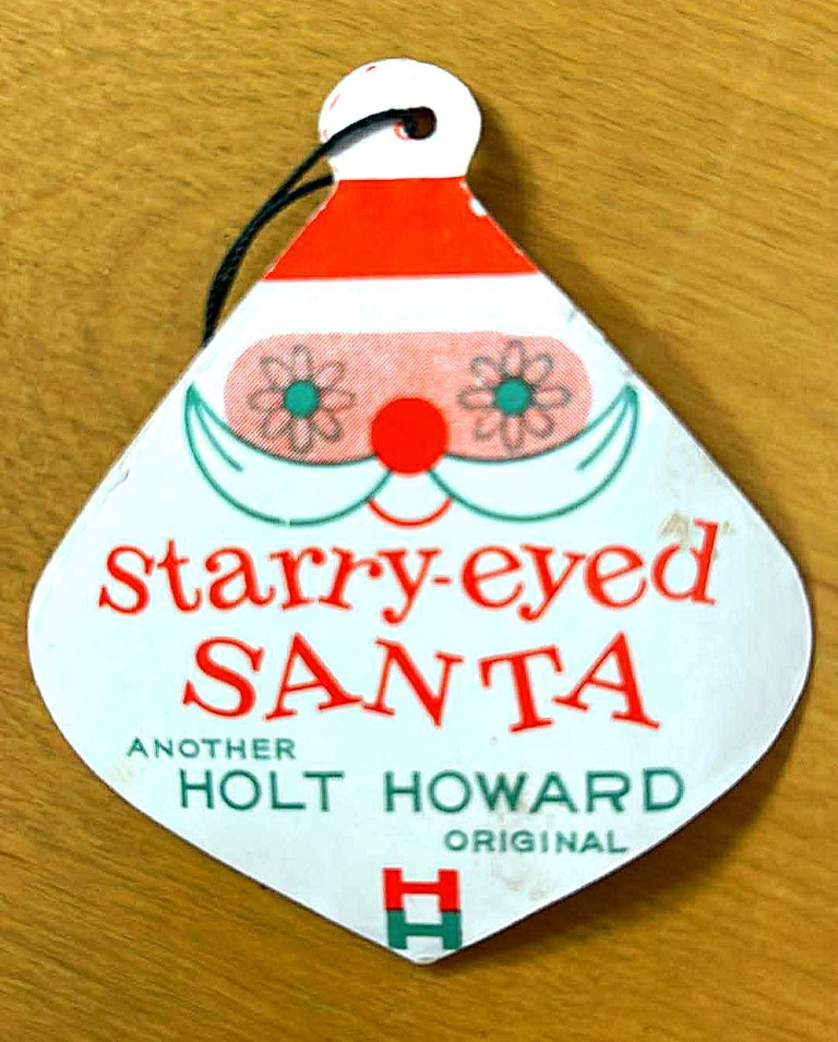 Front of an original Holt Howard Starry-Eyed Santa hang tag.