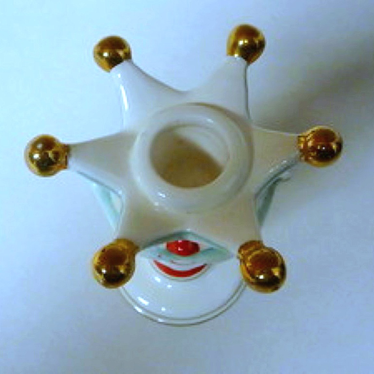 Top view of King Santa candleholder showing central candle opening.