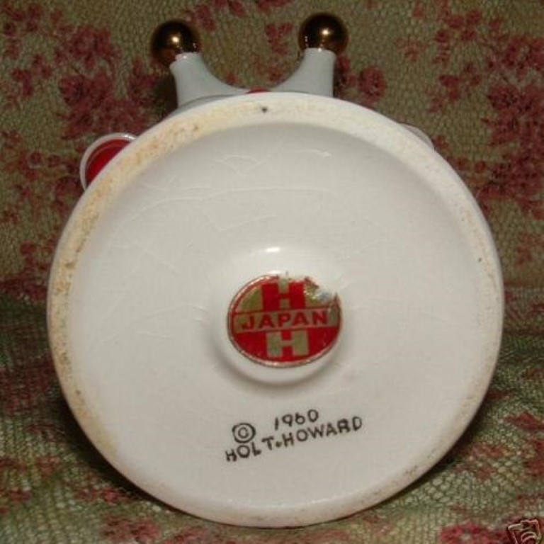 Bottom mark on King Santa candleholder vase.